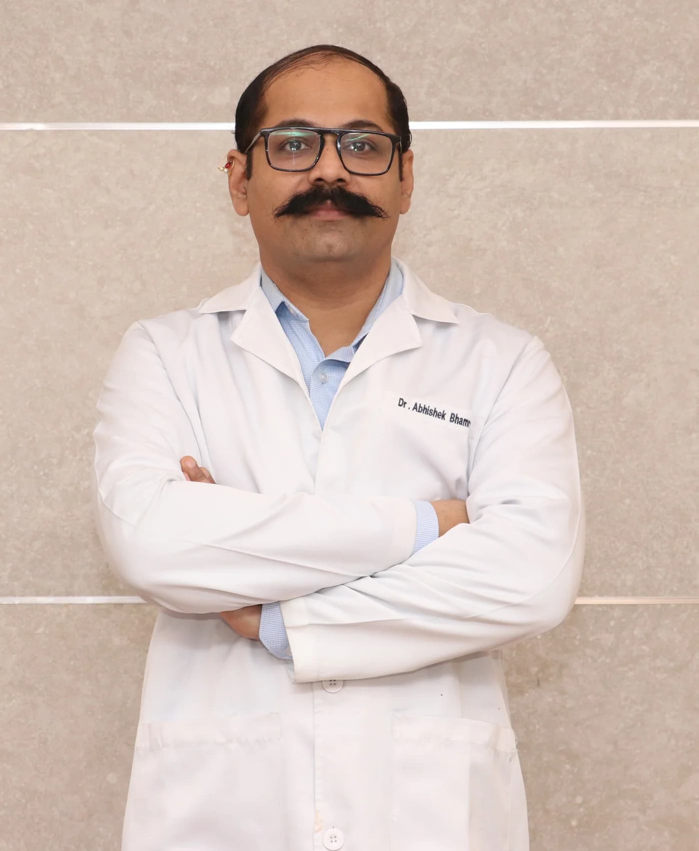 Dr. Abhishek Bhamre